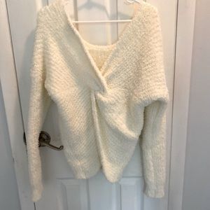 Women’s cream sweater with twist back